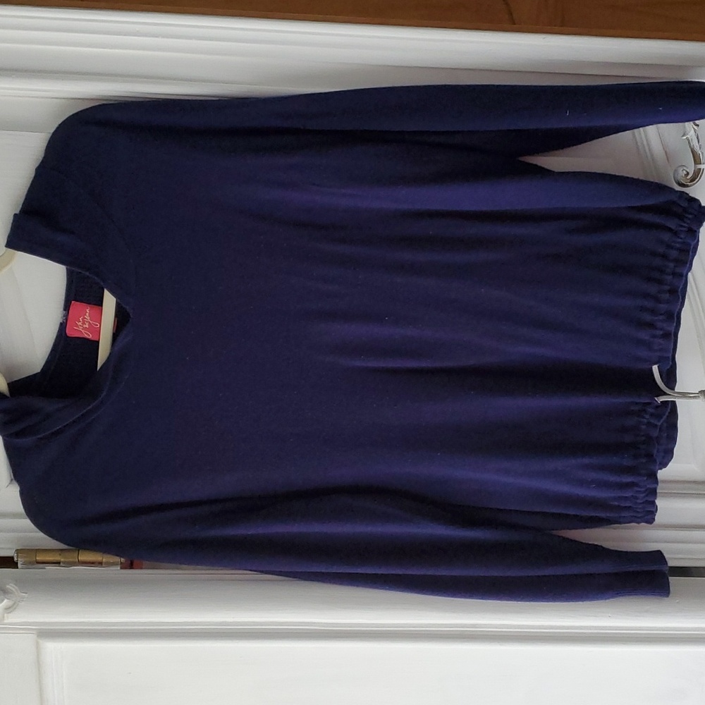 Light weight sweater for the beach. Drawstring and hood